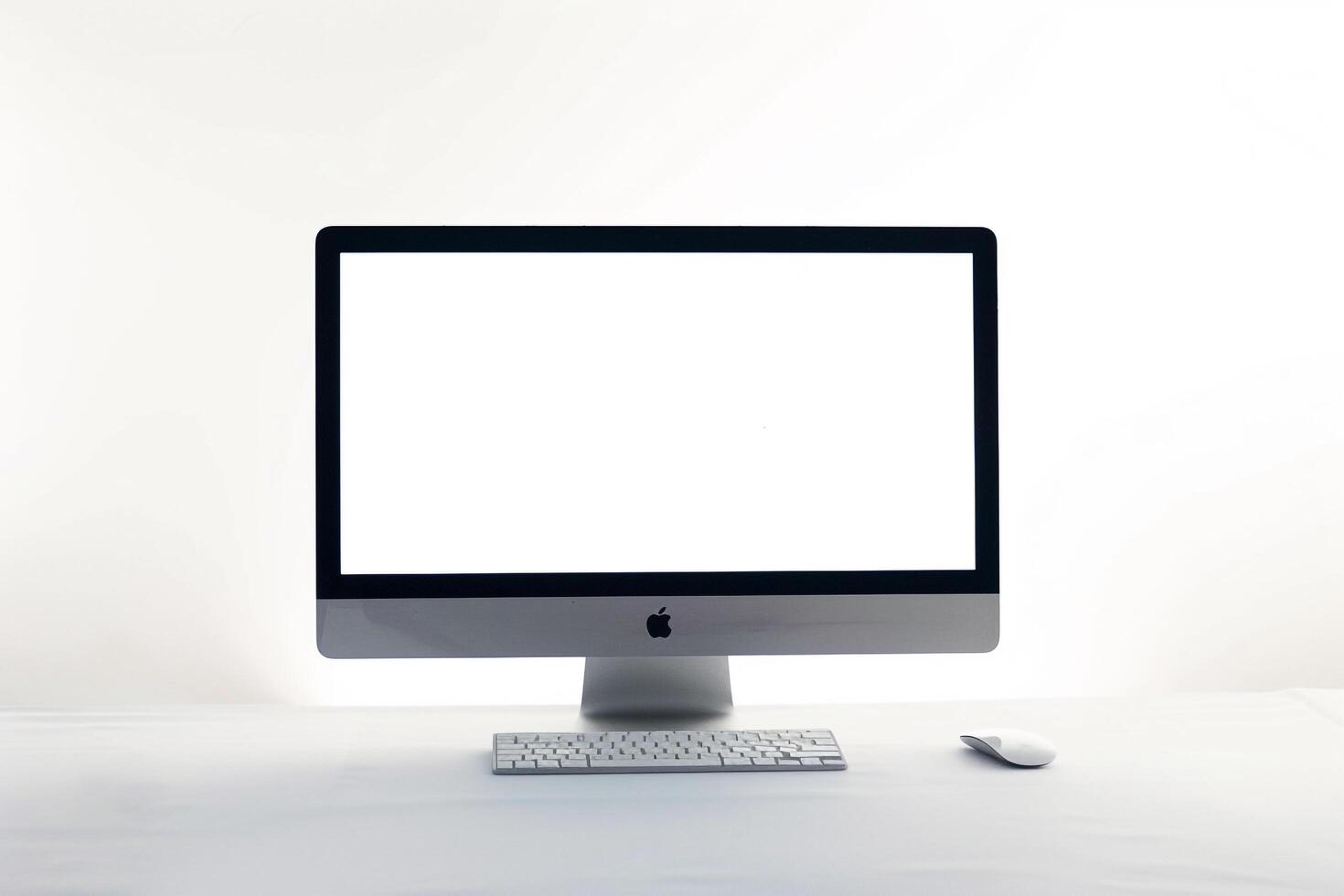 Computer Mockup Background Featuring Wireless Keyboard and   Setup photo