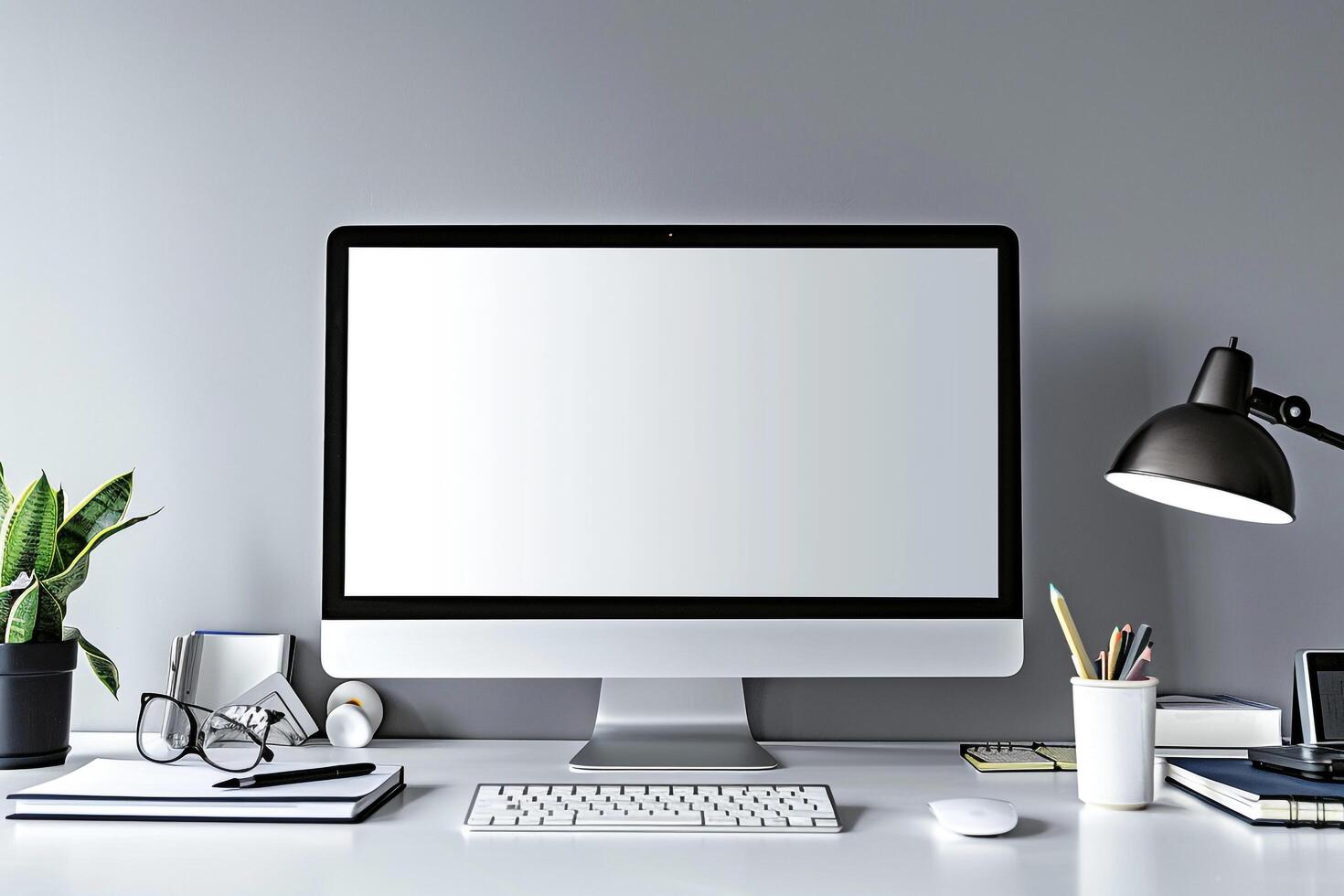 Computer Monitor Mockup with Office Supplies on White Desk for Tech Projects photo