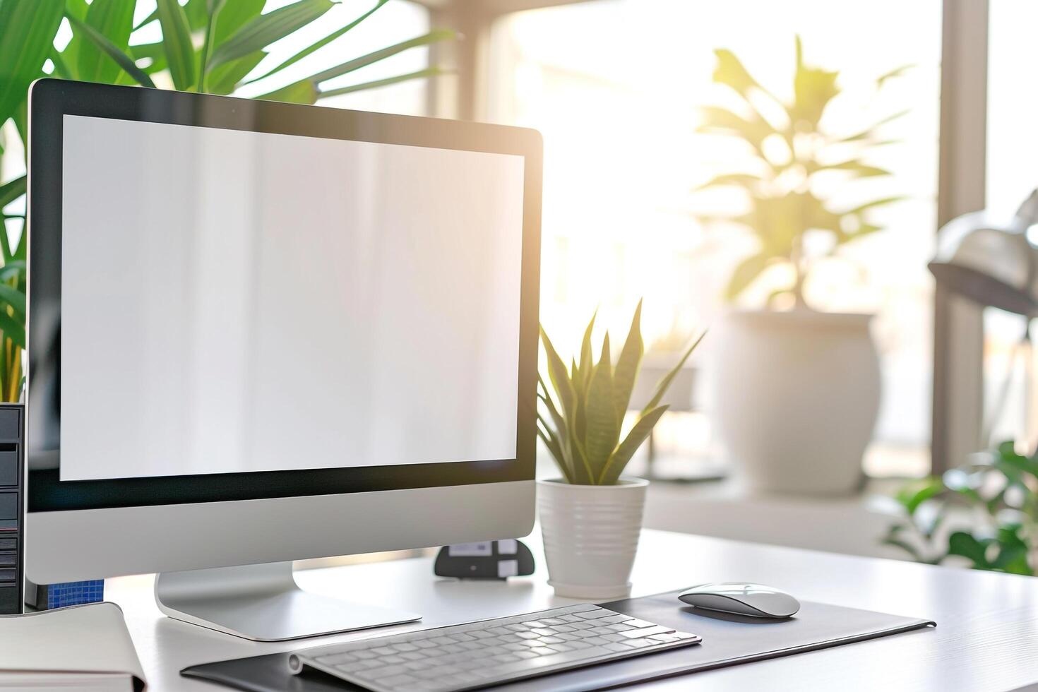 Desktop Computer Mockup on White Desk with Office Items photo
