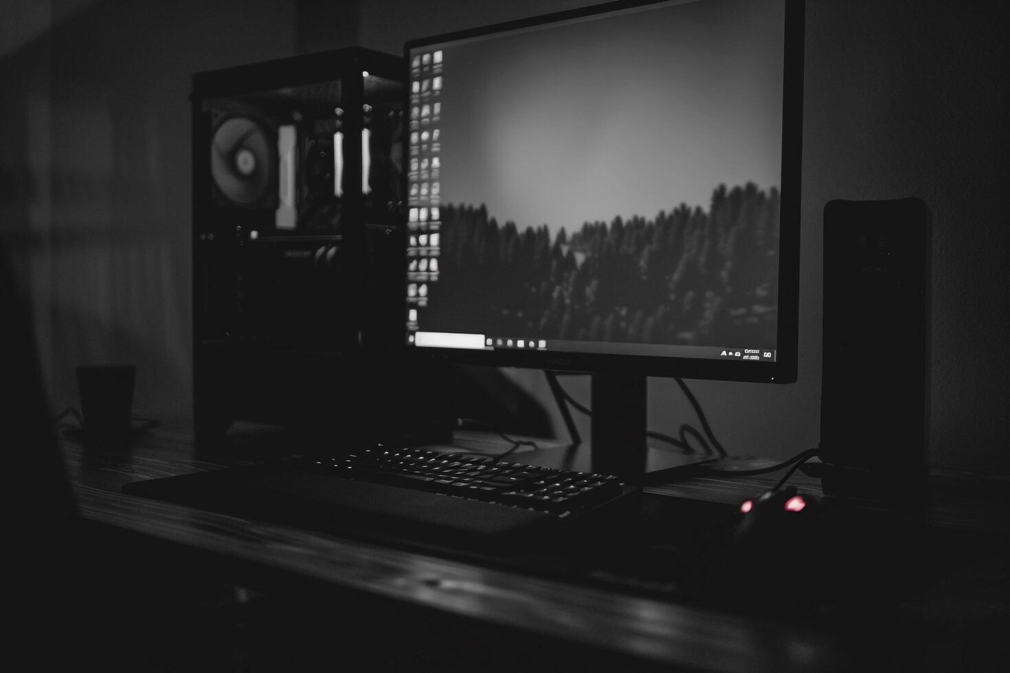 Noir Inspired Desktop Computer Mockup with Deep Black Background photo