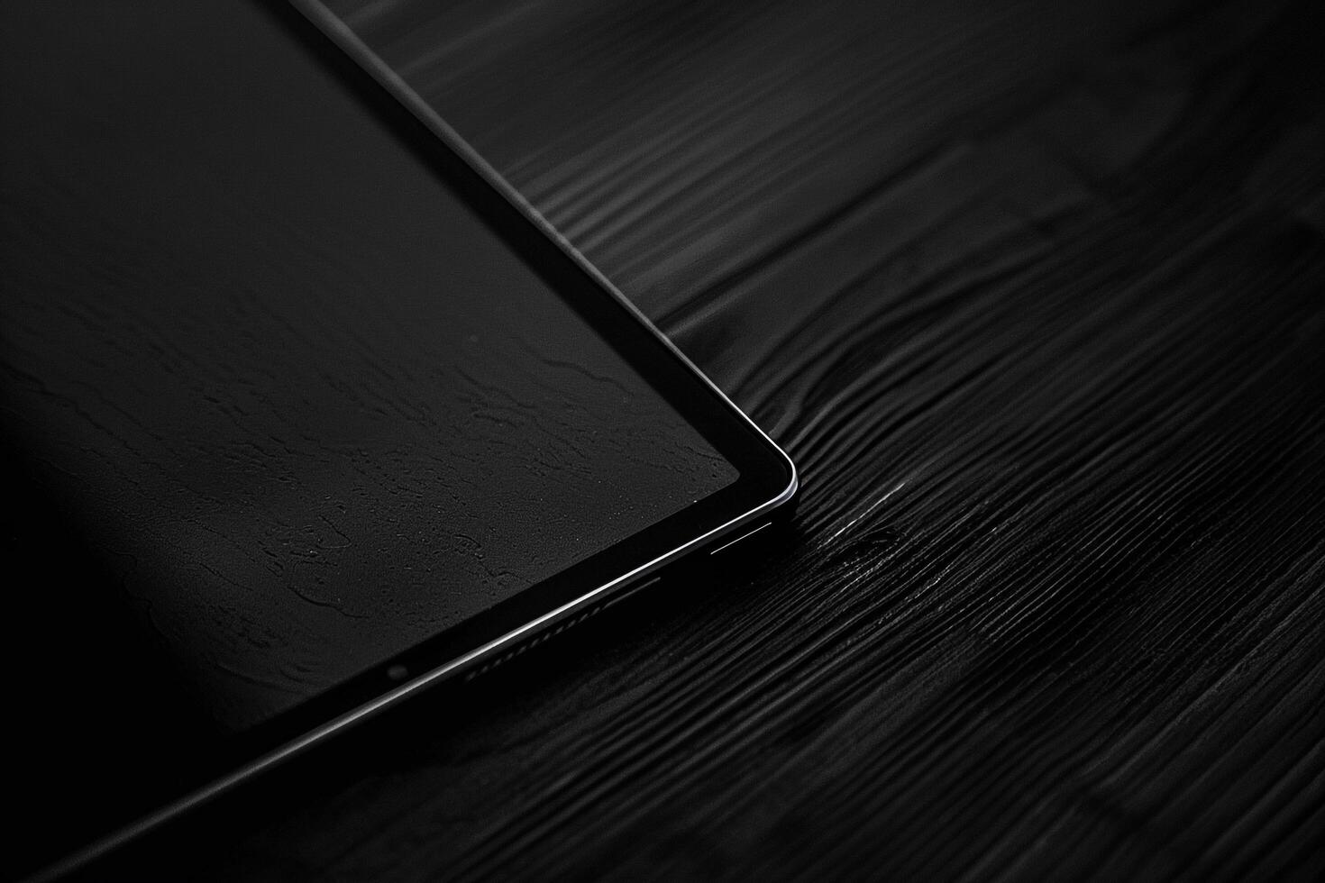 Noir Tablet Mockup with Glossy Black Finish and Tech Driven Design photo