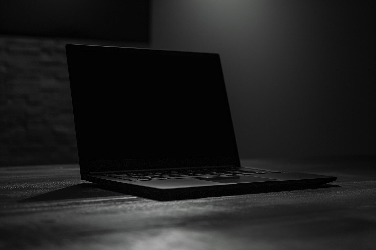 Noir Laptop Mockup with Glossy Black Finish and   Design photo