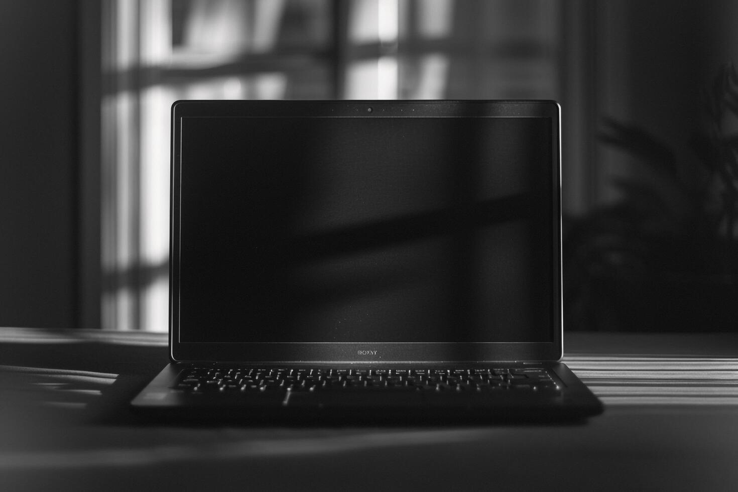 Noir Laptop Mockup with Refined Black Surface and Tech Savvy Look photo