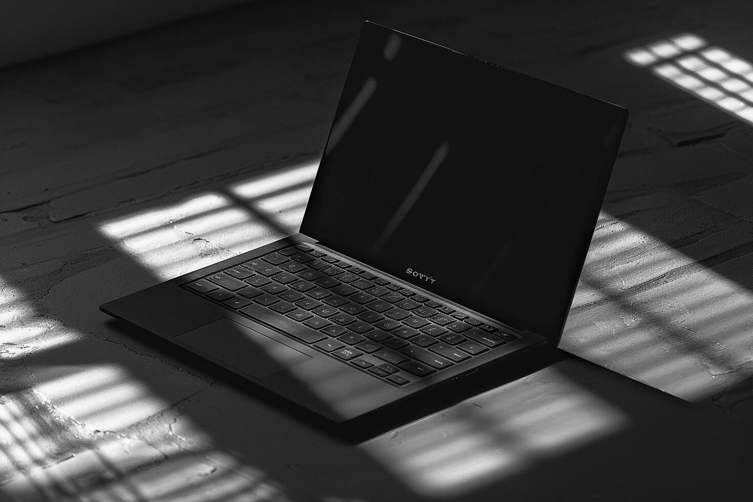 Noir Laptop Mockup with Refined Black and   Design photo