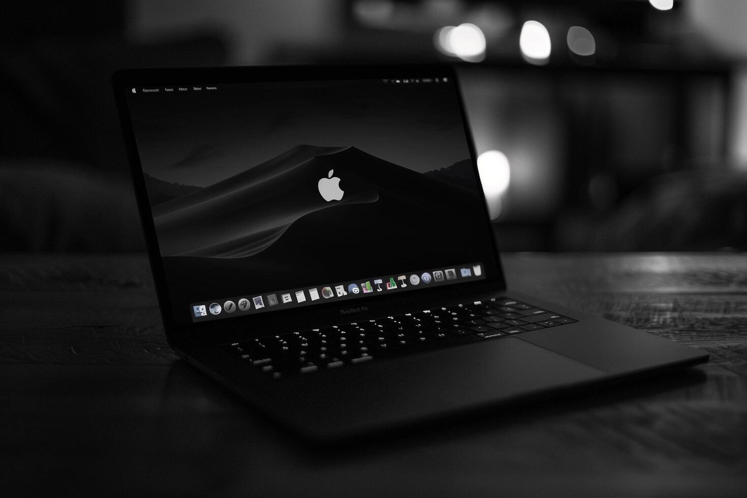 Noir Laptop Mockup with Glossy Black Finish and Tech Inspired Design photo