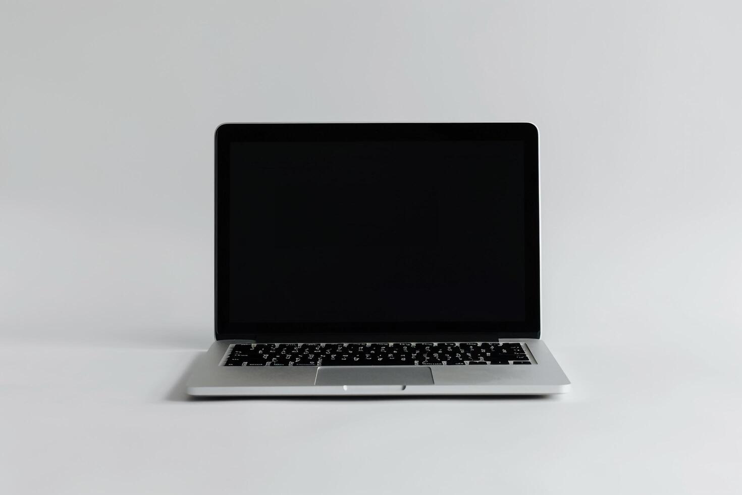 Laptop Mockup with Blank Screen on White Desk Ideal for Digital Content Creation photo