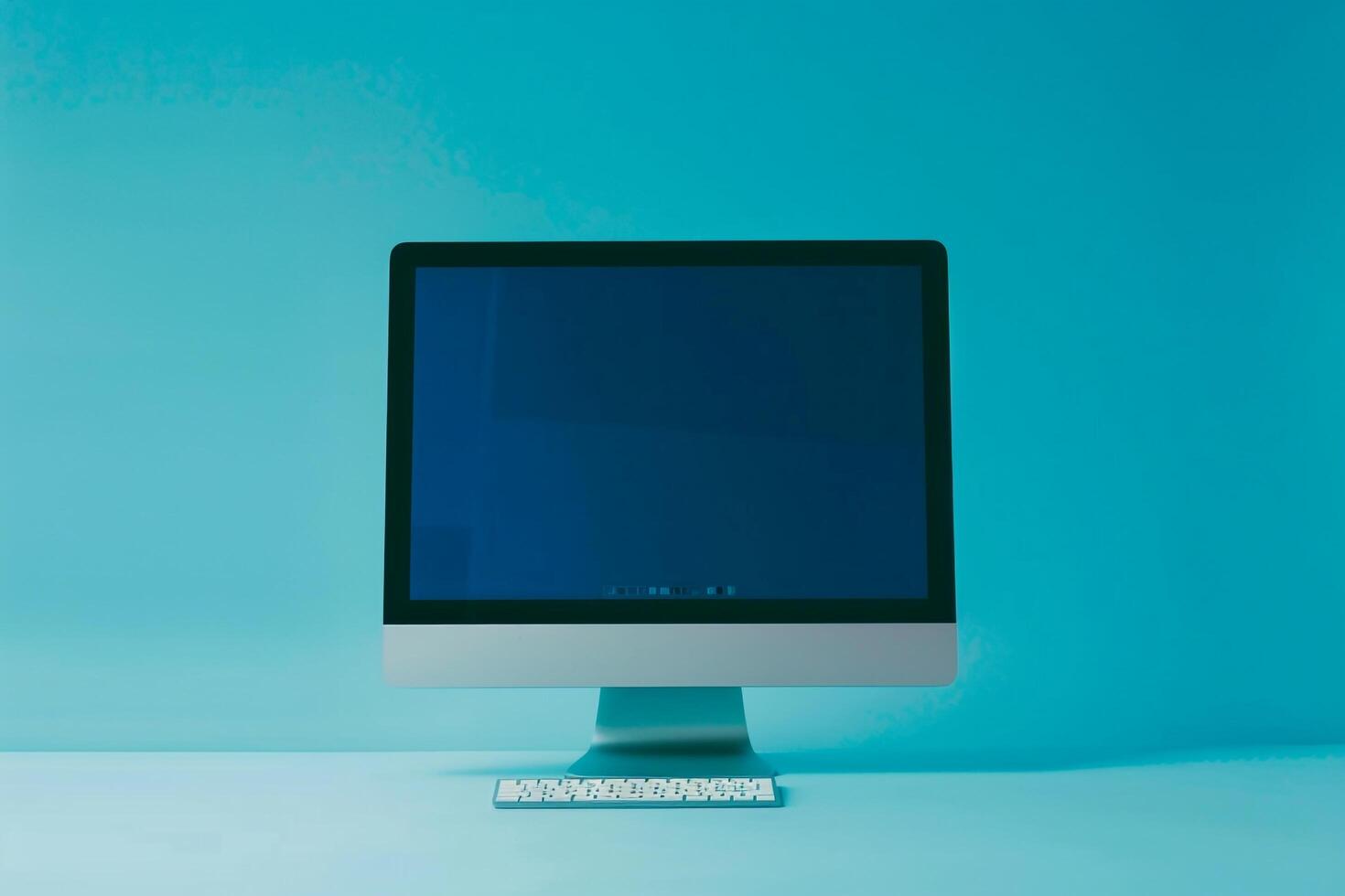 Desktop computer mockup with blank screen on  background photo