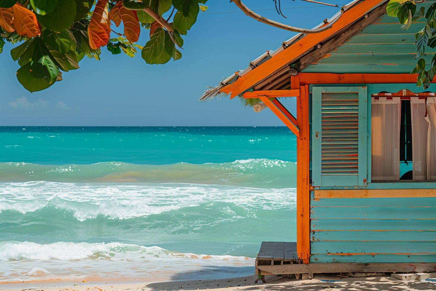 Beach hut on tropical shore with turquoise waves photo