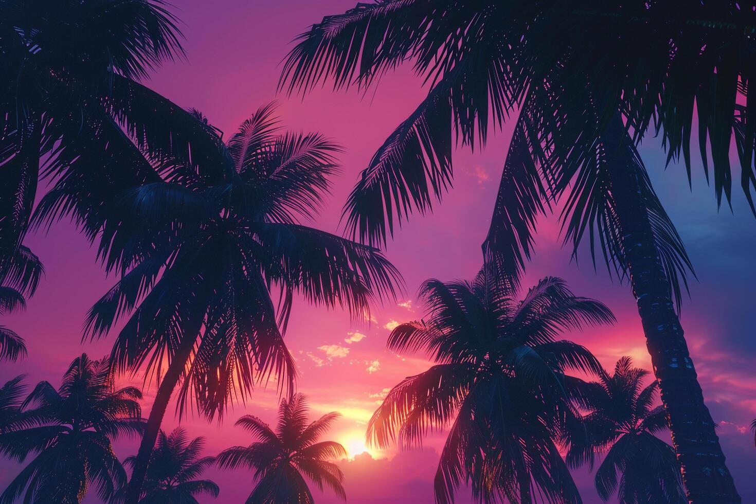 Palm Trees Silhouetted Against  Sunset Sky on Tropical Beach photo