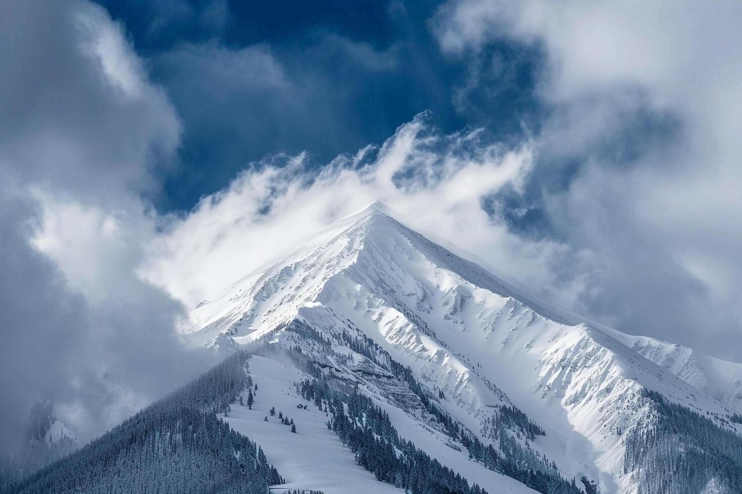 Snow Capped Mountain Peak in a Dramatic Cloudy Sky with a Majestic and Scenic Winter  Background photo