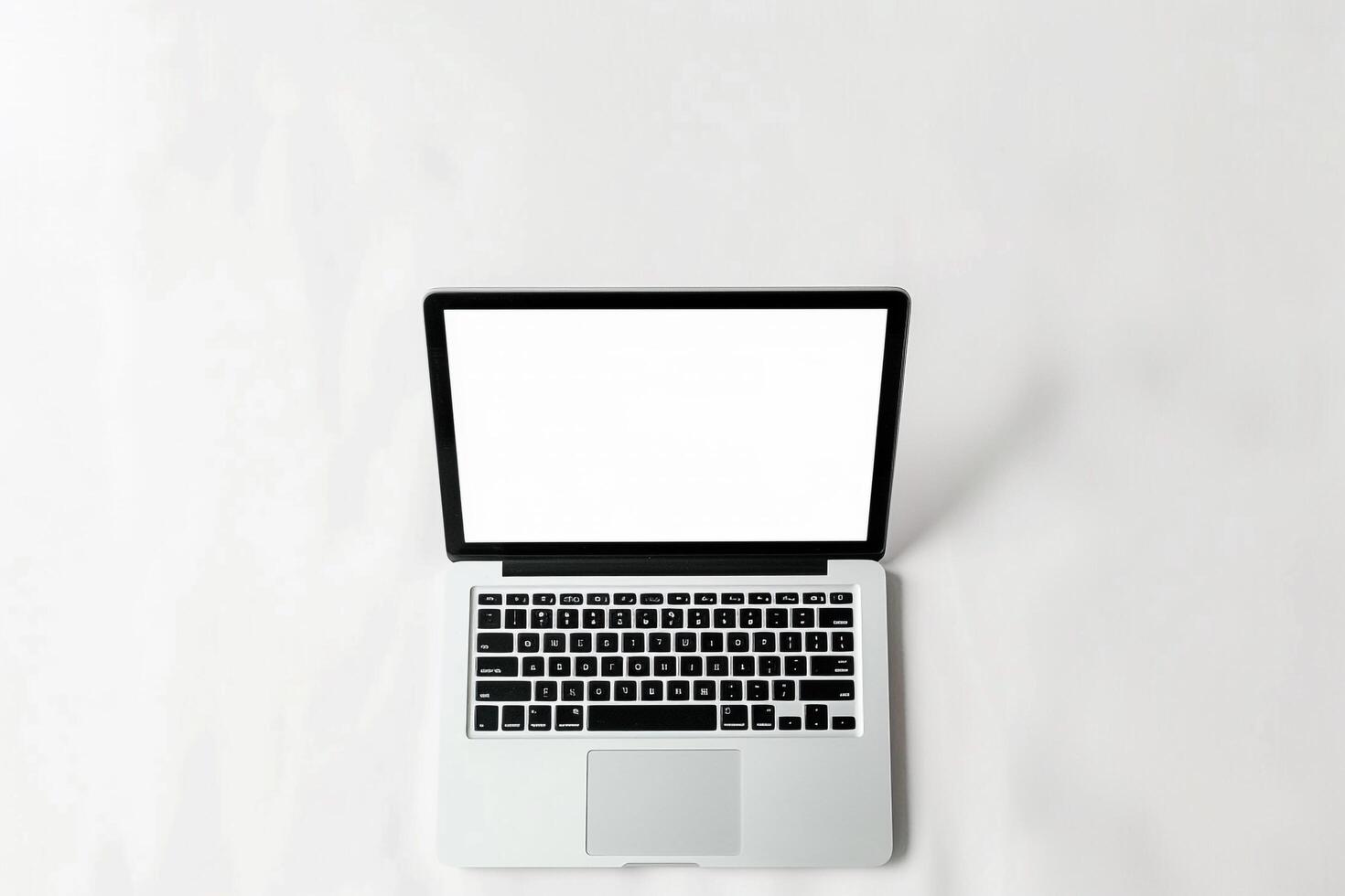 Laptop Mockup with Blank Screen on White Surface Perfect for Business Presentations photo