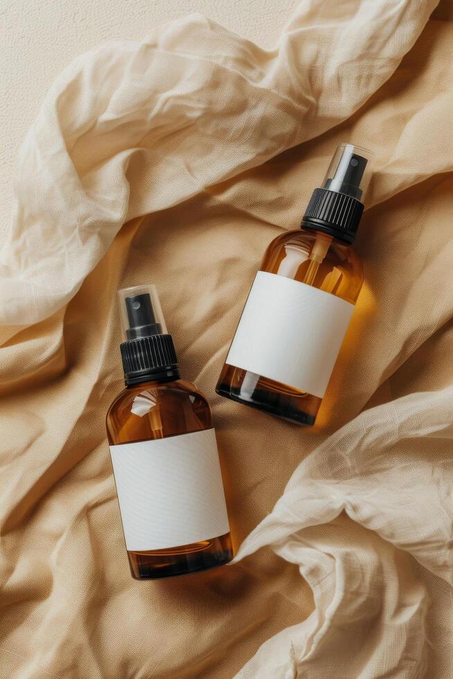 Amber Bottles With Blank Labels on Fabric photo