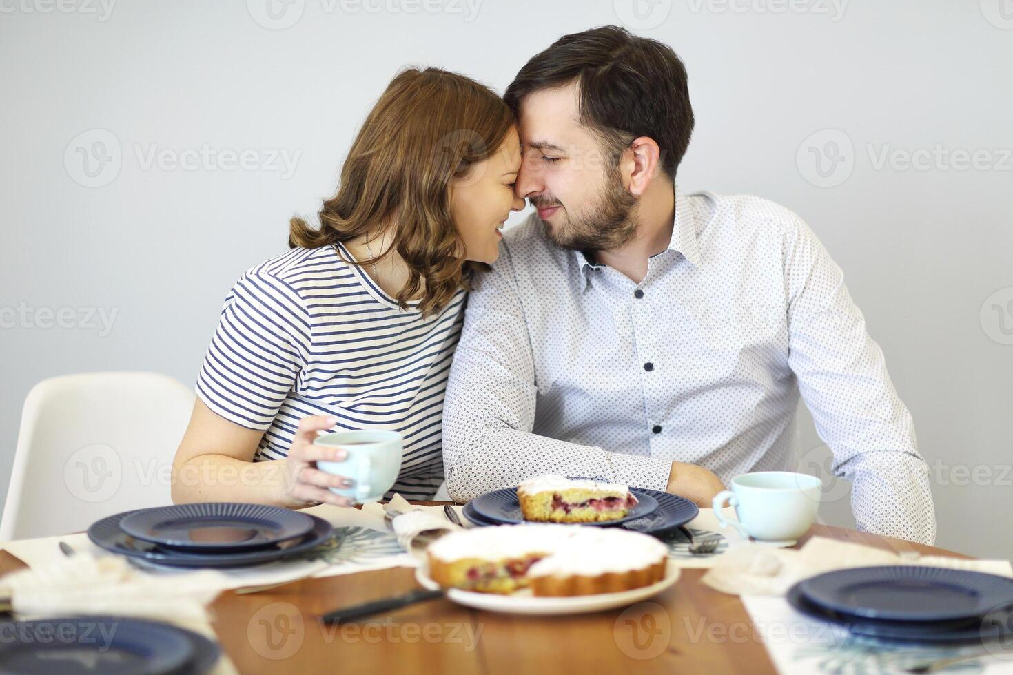 Couple having breakfast together in morning photo