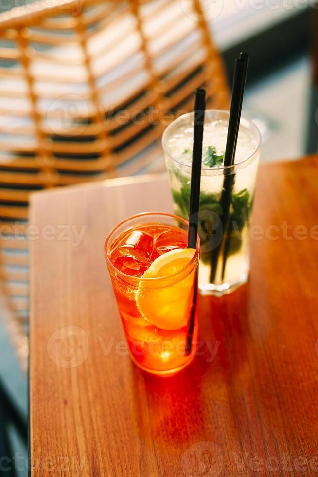 Cold cocktails on bar table photo