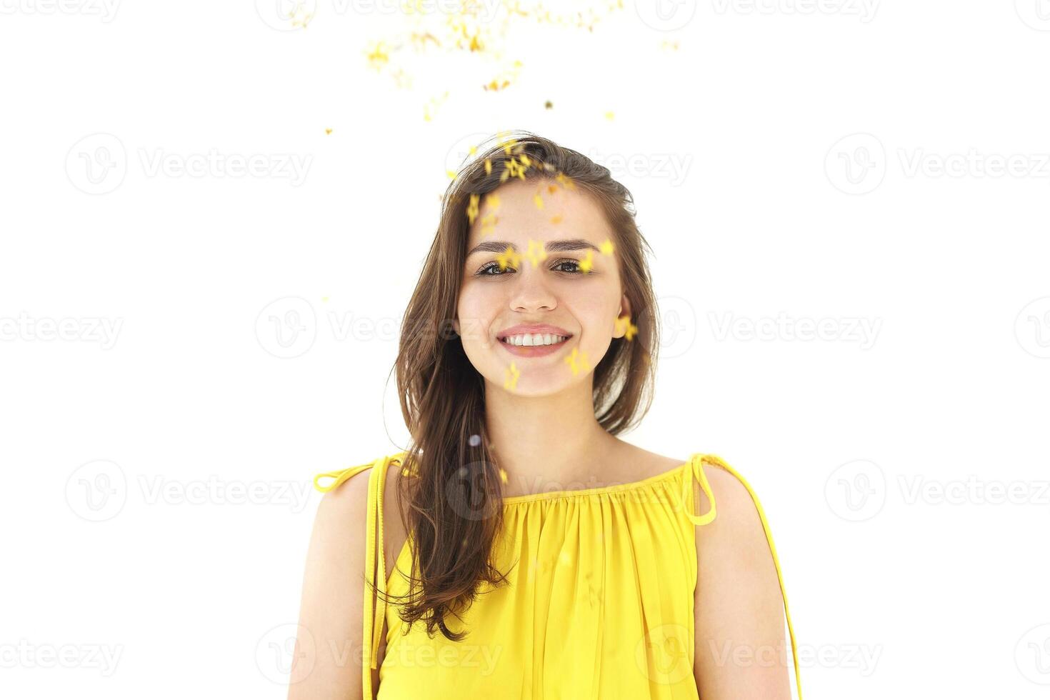 Portrait of beautiful elegant charming brunette girl with beaming smile in summer dress photo