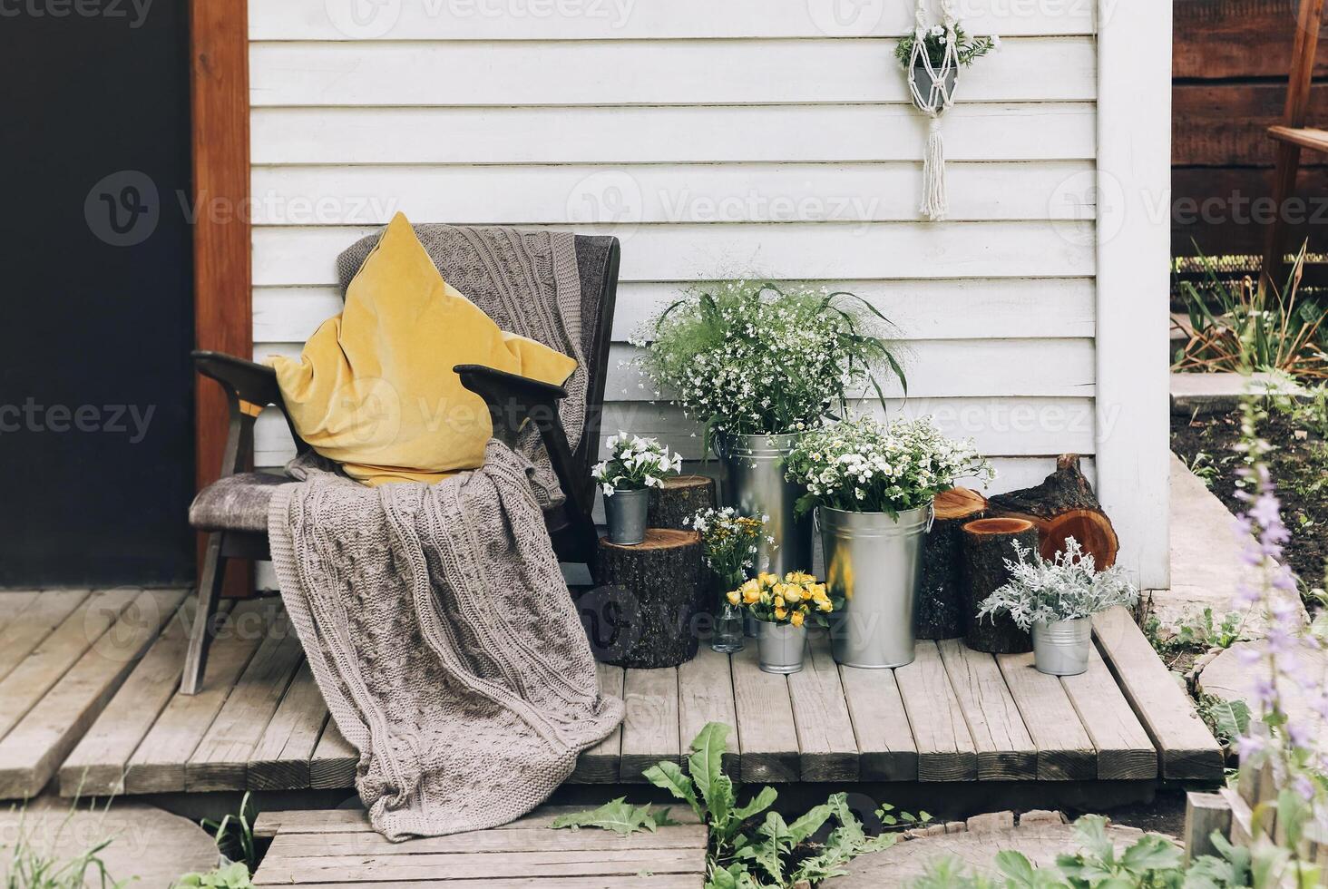 Cozy house in green garden photo