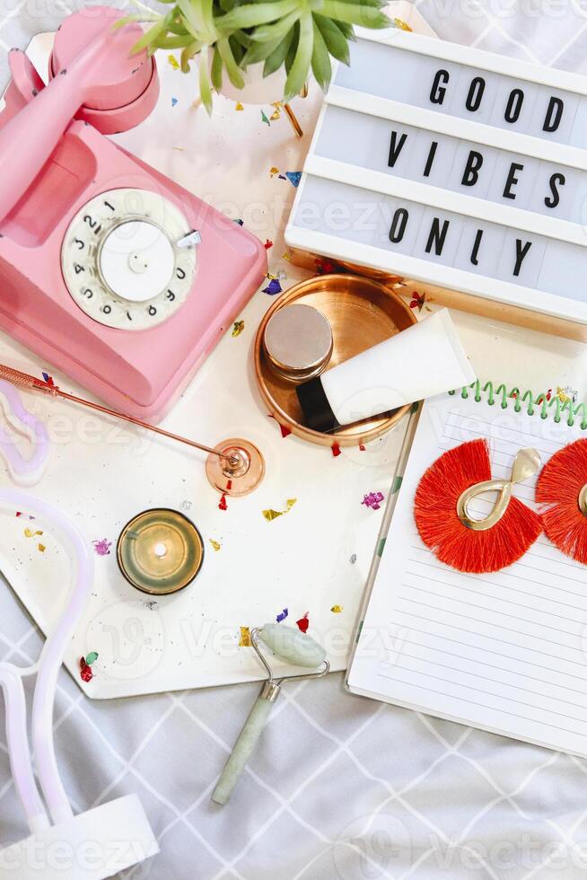 Girly accessories on bed at home photo