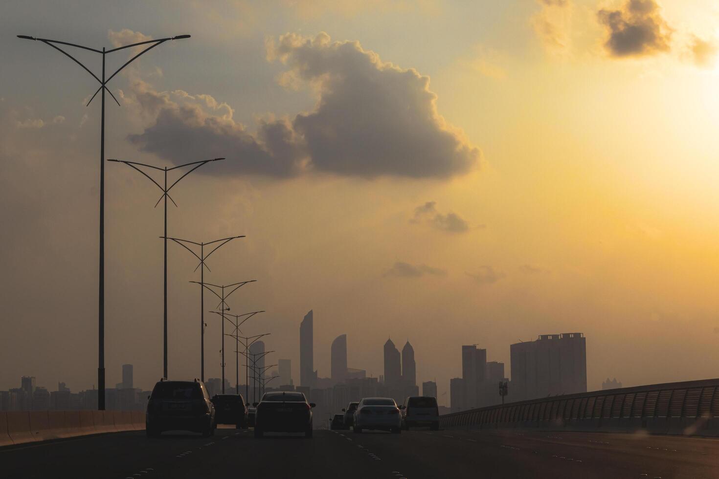 Abu Dhabi city during sunset, Beautiful sky at sunset, clouds during sunset photo