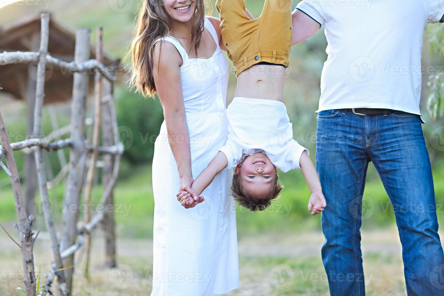 Happy family with little son having fun photo