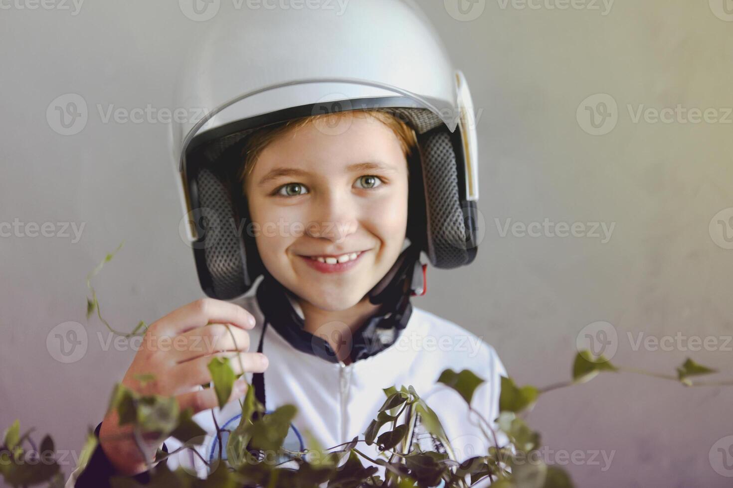Astronaut futuristic kid girl wearing white uniform and helmet photo