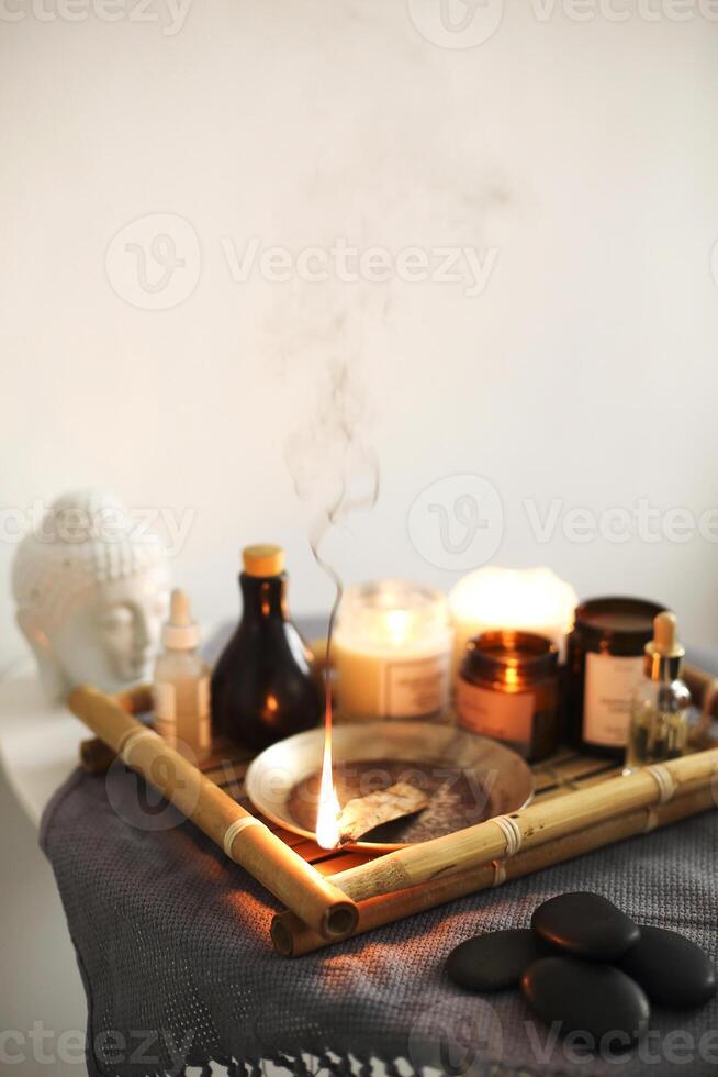 Incense burning during aromatherapy session photo