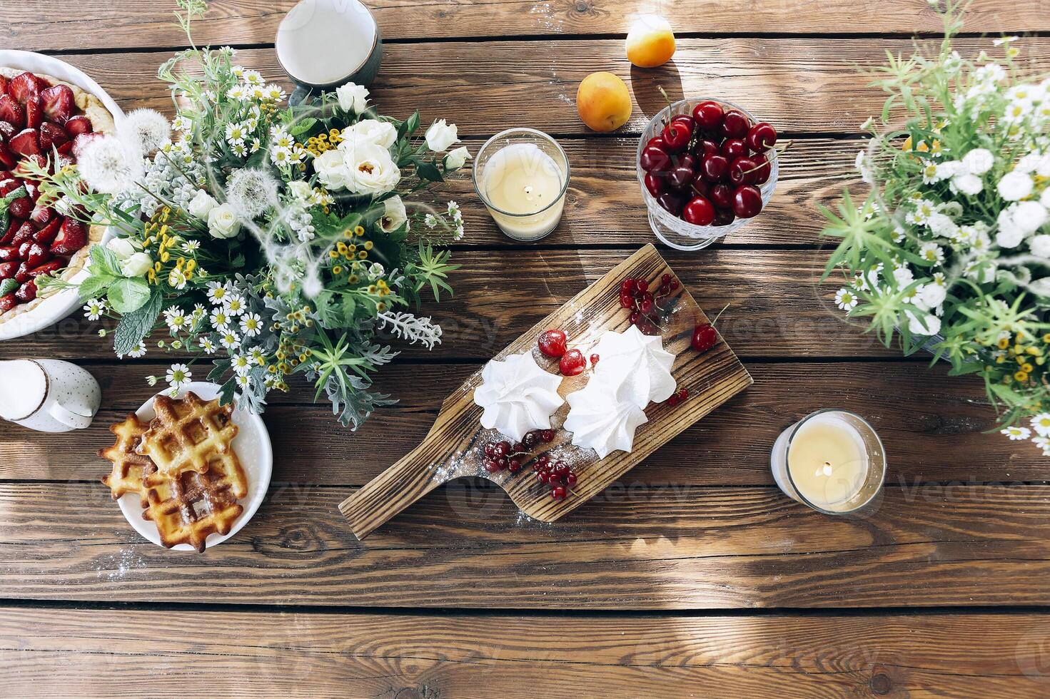 Appetizing breakfast on table on terrace photo
