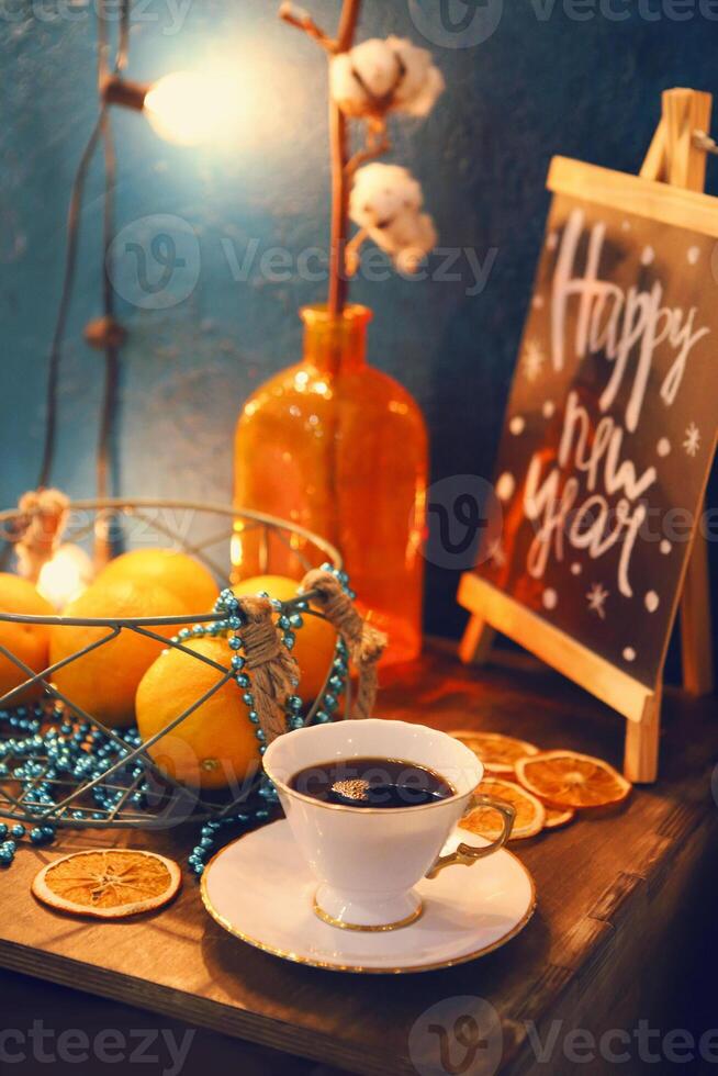 Christmas background. Clean blank, coffee, christmas decorations, coffee, citruses and light background photo