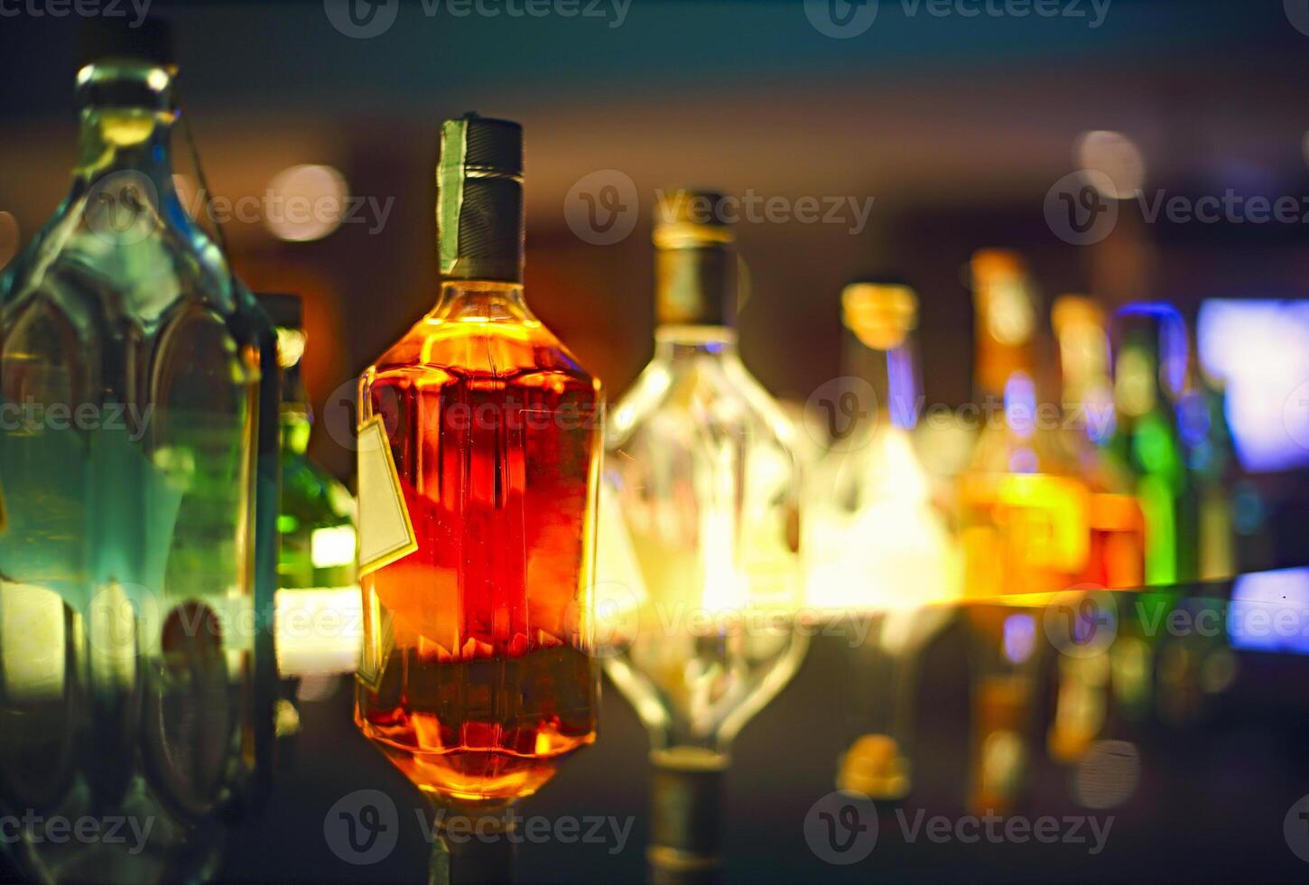 Bar counter with bottles in blurred background photo