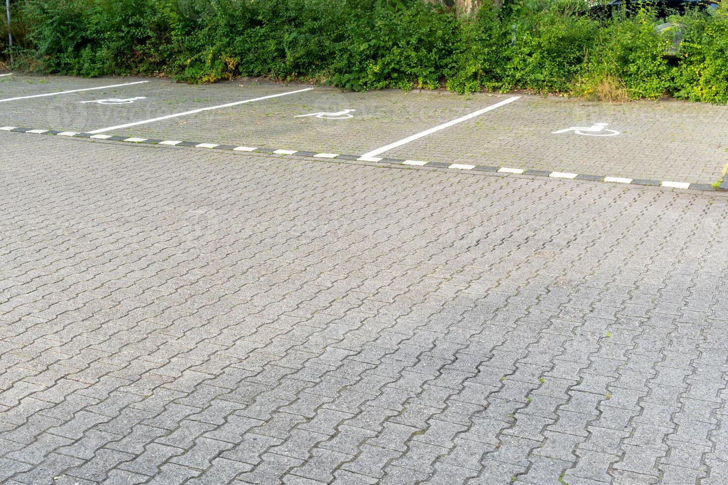 Car park with parking spaces for the disabled photo