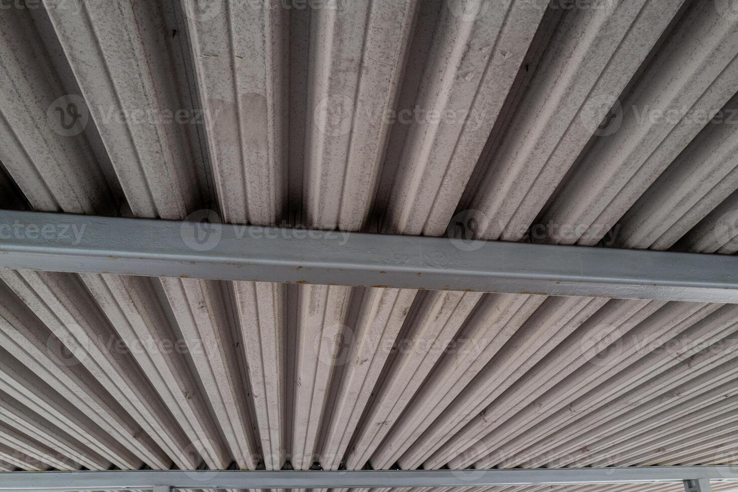 large concrete canopy with supports from below photo
