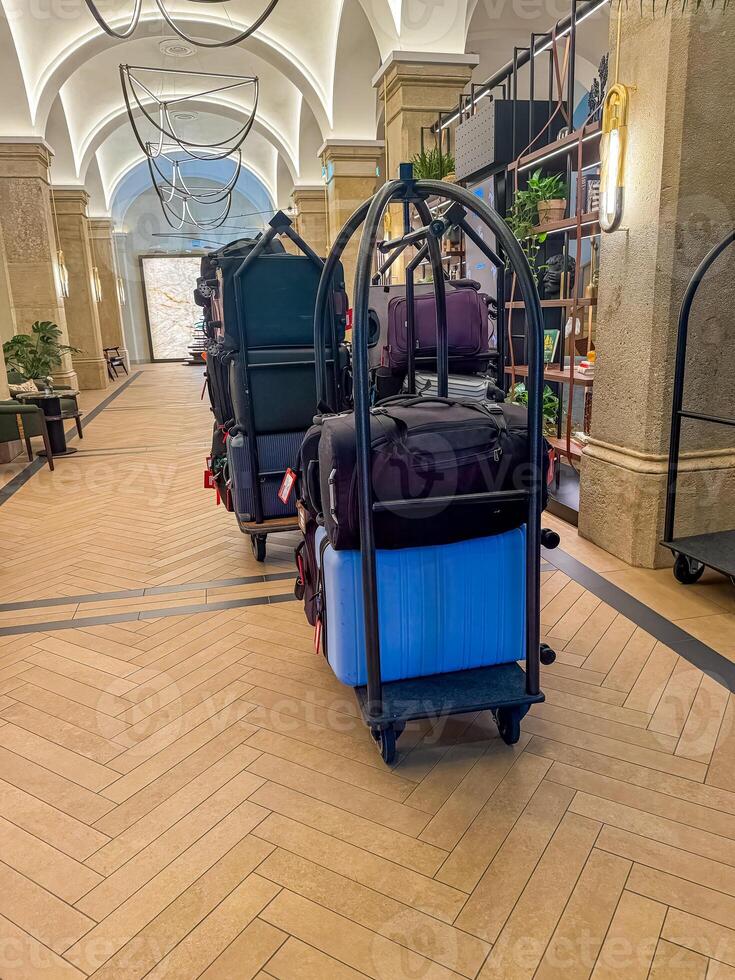 Hotel luggage cart baggage trolley in the hotel lobby hallway background. High quality photo
