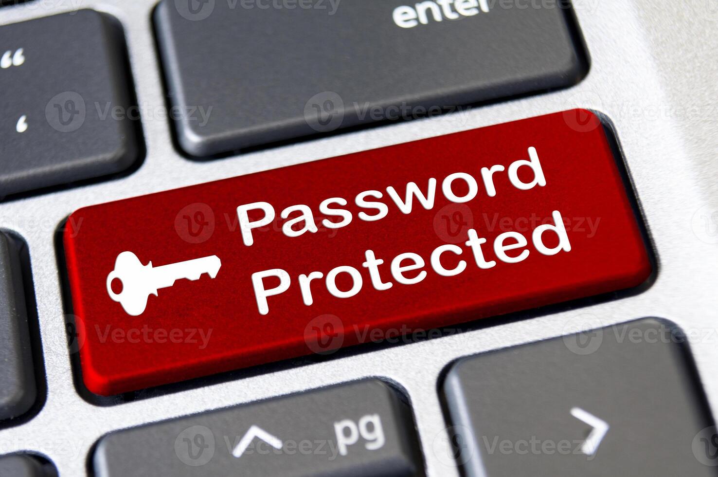 Password protected on red laptop keyboard button. Security and password concept photo