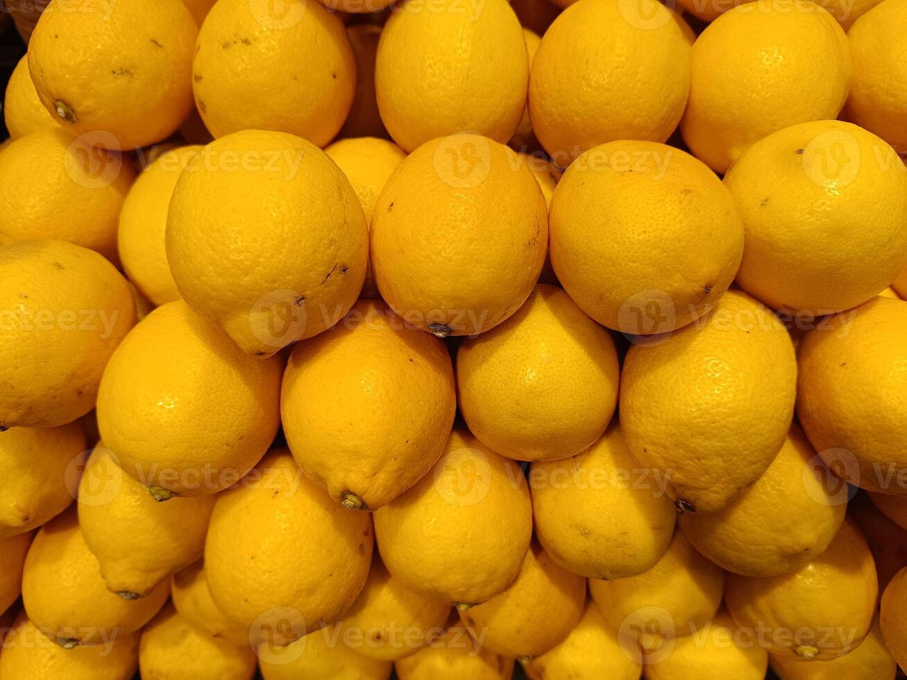 Arranged lemons in a supermarket photo