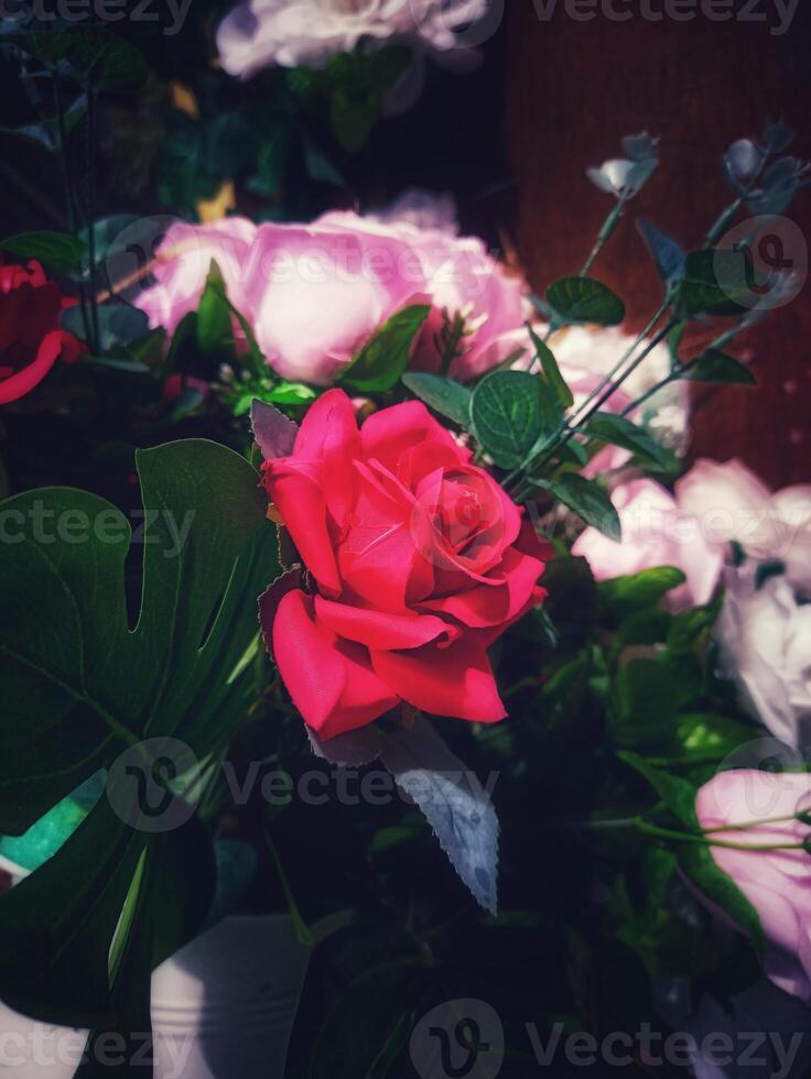 silk flower decorations from realistic imitation florals in portrait mode photo