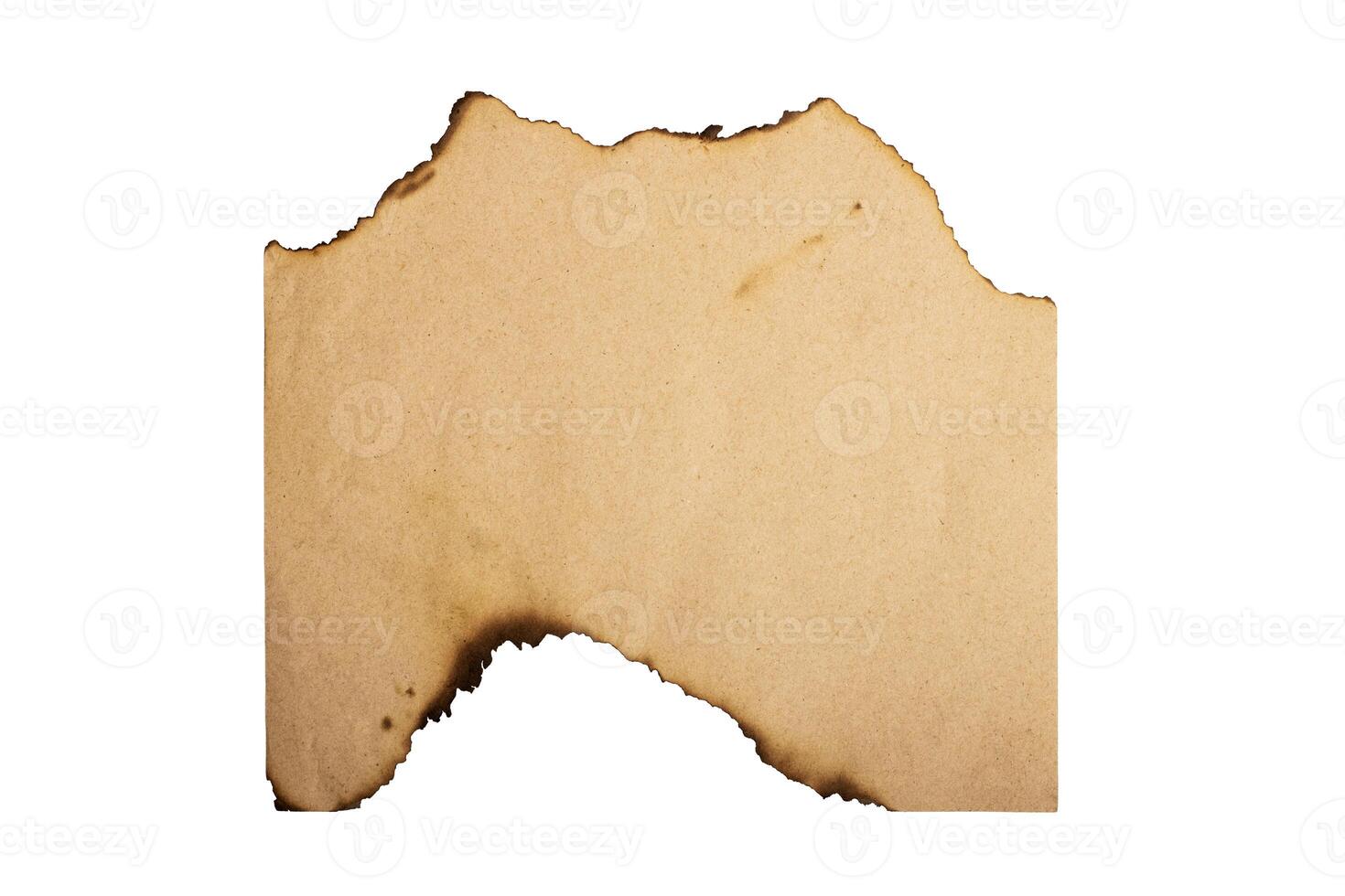 Vintage paper with burnt edges isolated on white background. photo