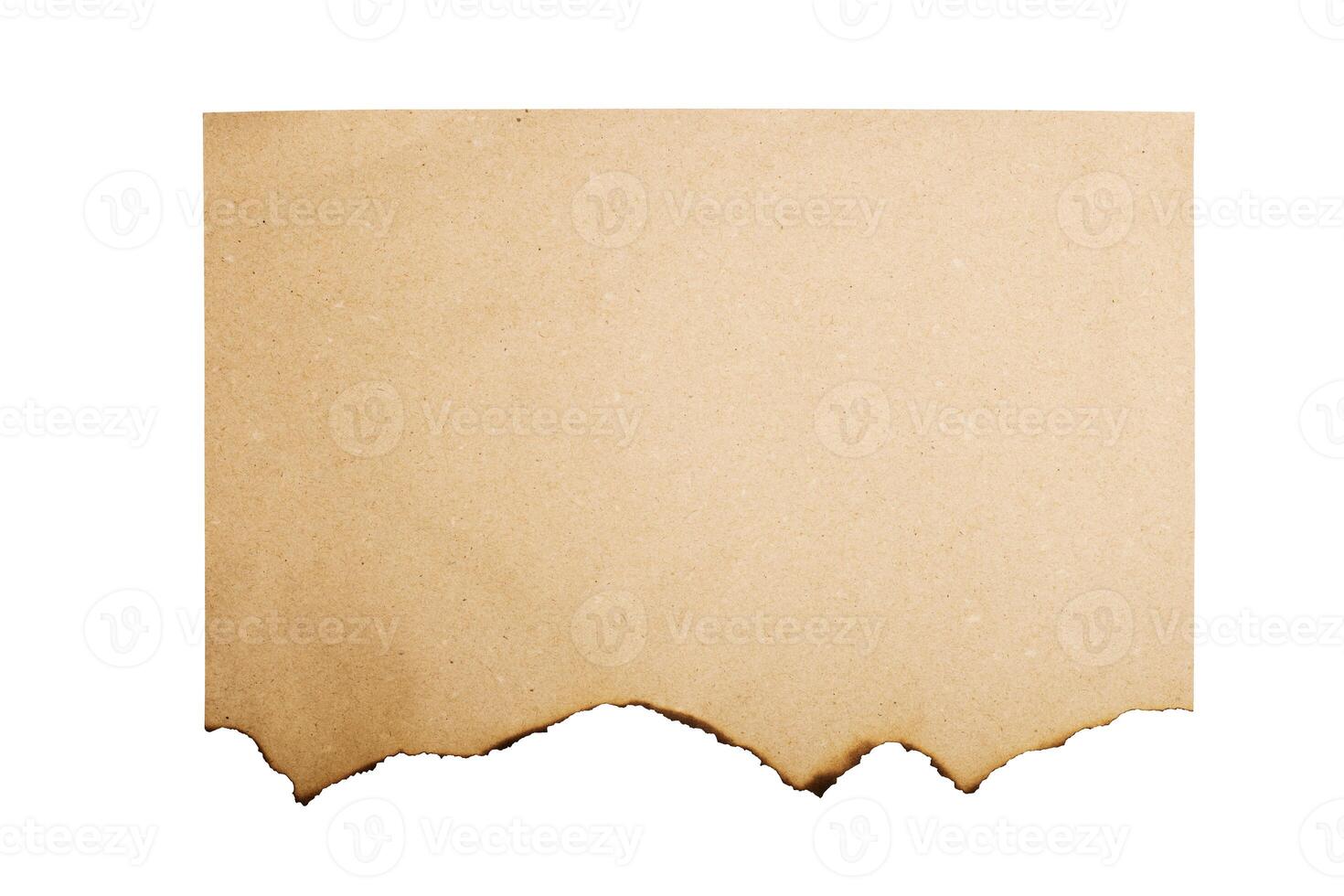 Vintage paper with burnt edges isolated on white background. photo