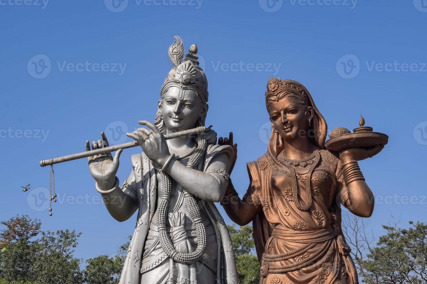 Big statue of Lord Radha Krishna near Delhi International airport, Delhi, India, Lord Krishna and Radha big statue touching sky at main highway Mahipalpur, Delhi photo