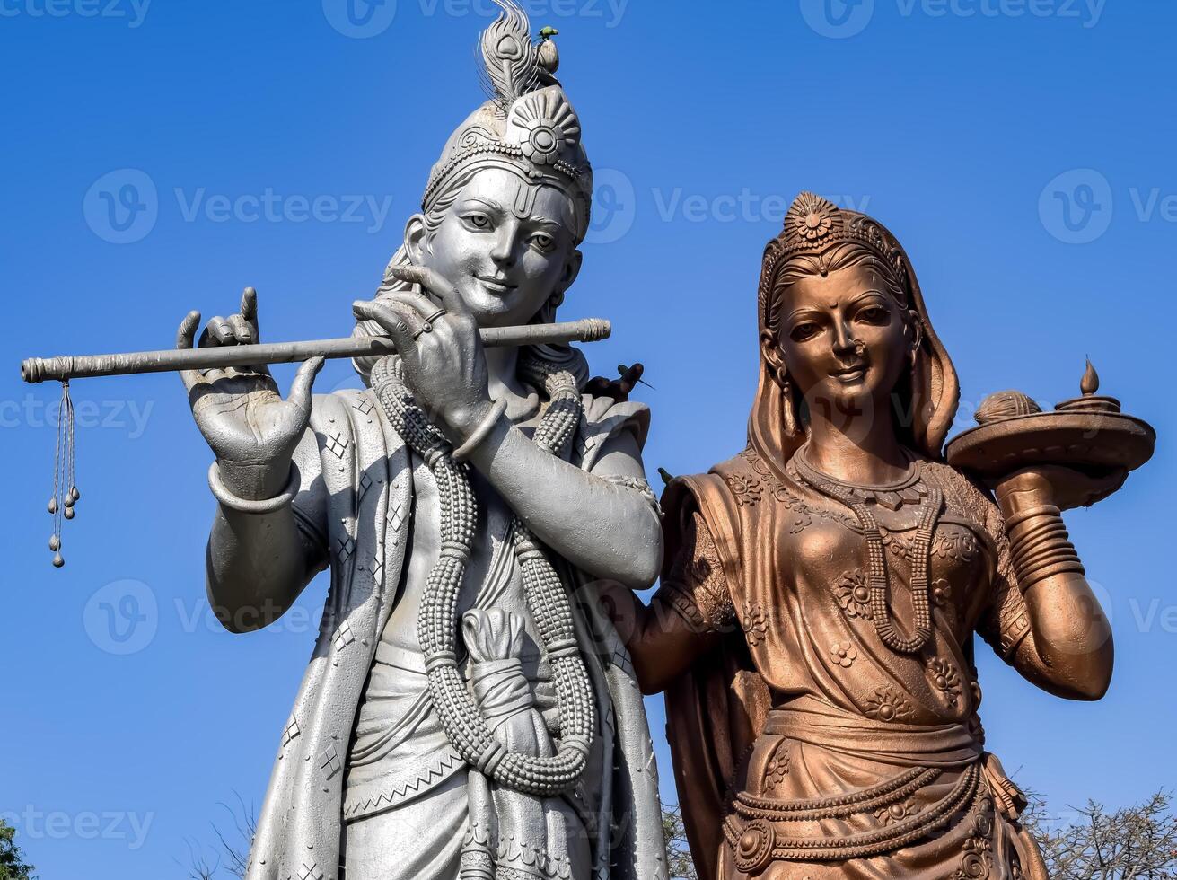 Big statue of Lord Radha Krishna near Delhi International airport, Delhi, India, Lord Krishna and Radha big statue touching sky at main highway Mahipalpur, Delhi photo