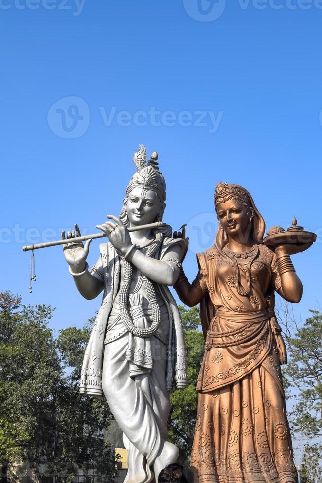 Big statue of Lord Radha Krishna near Delhi International airport, Delhi, India, Lord Krishna and Radha big statue touching sky at main highway Mahipalpur, Delhi photo