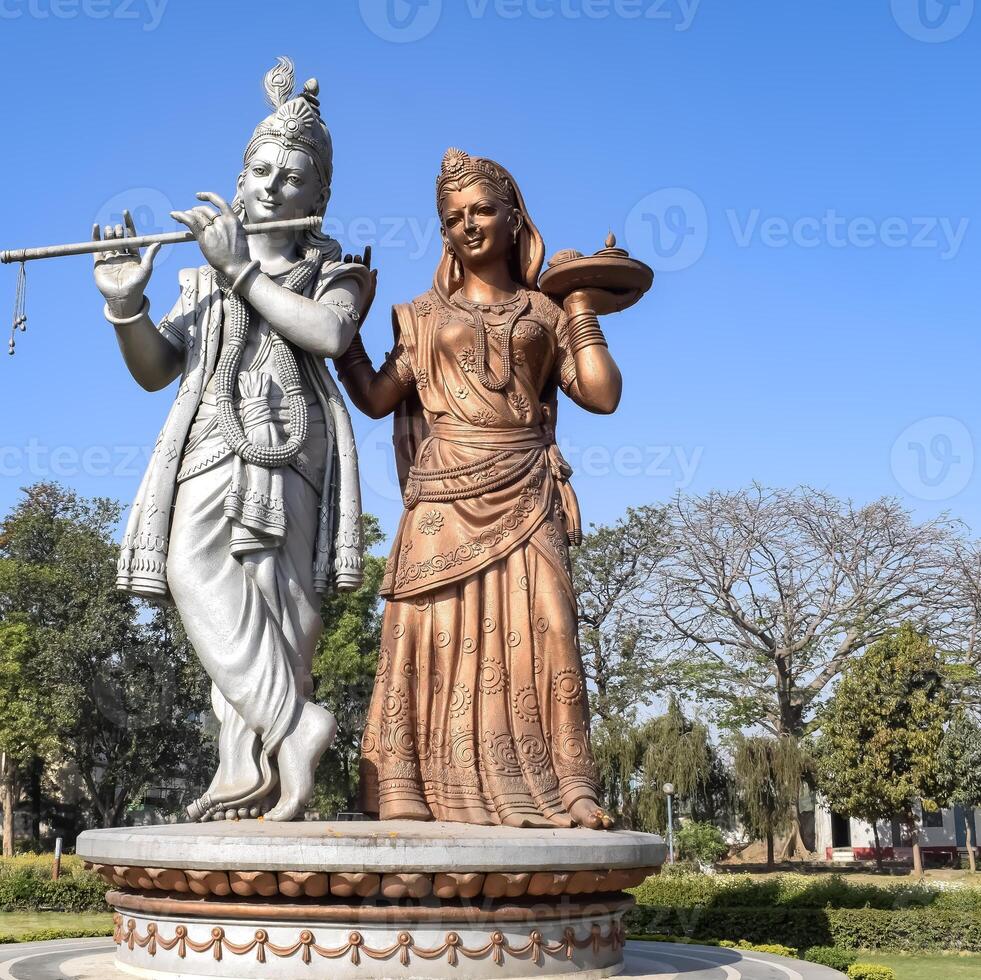Big statue of Lord Radha Krishna near Delhi International airport, Delhi, India, Lord Krishna and Radha big statue touching sky at main highway Mahipalpur, Delhi photo