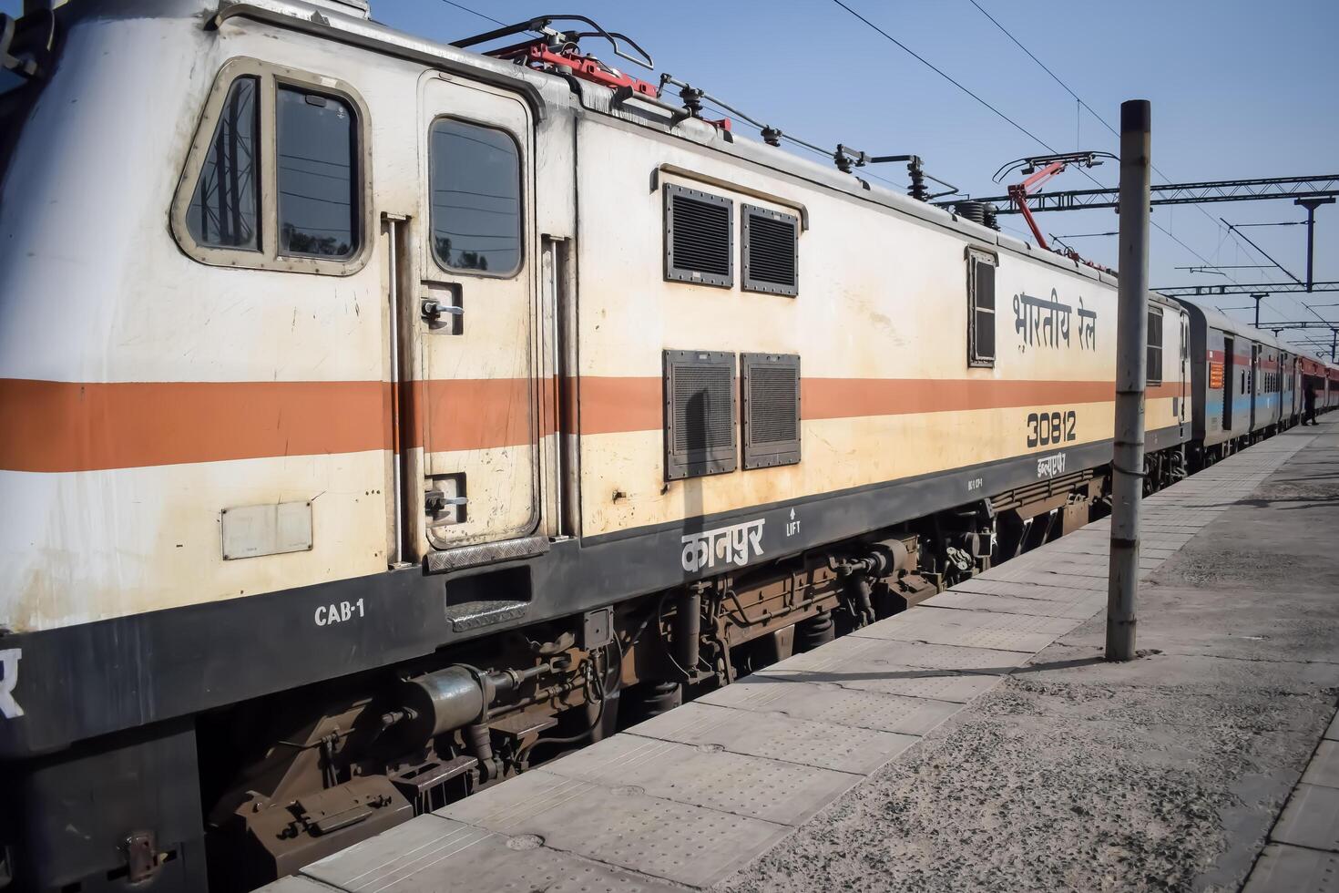Delhi, India, June 09 2024 - Indian train electric locomotive engine at Anand Vihar railway station during the day time, Express train electrical locomotive engine photo