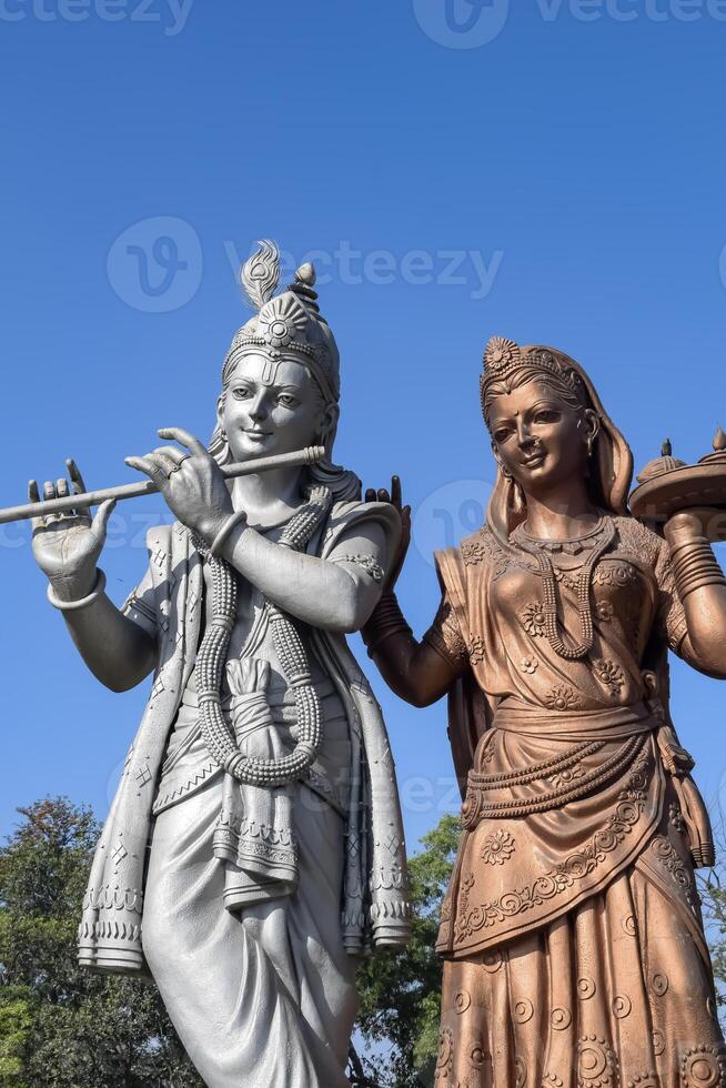 Big statue of Lord Radha Krishna near Delhi International airport, Delhi, India, Lord Krishna and Radha big statue touching sky at main highway Mahipalpur, Delhi photo