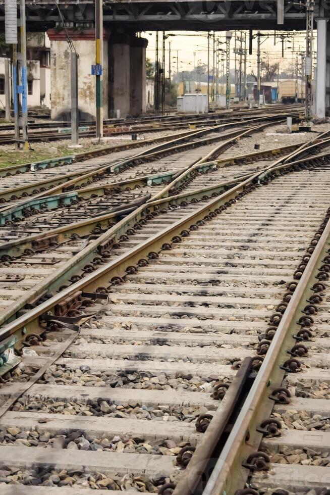 View of train Railway Tracks from the middle during daytime at Amritsar railway station in India, Train railway track view, Indian Railway junction, Heavy industry photo