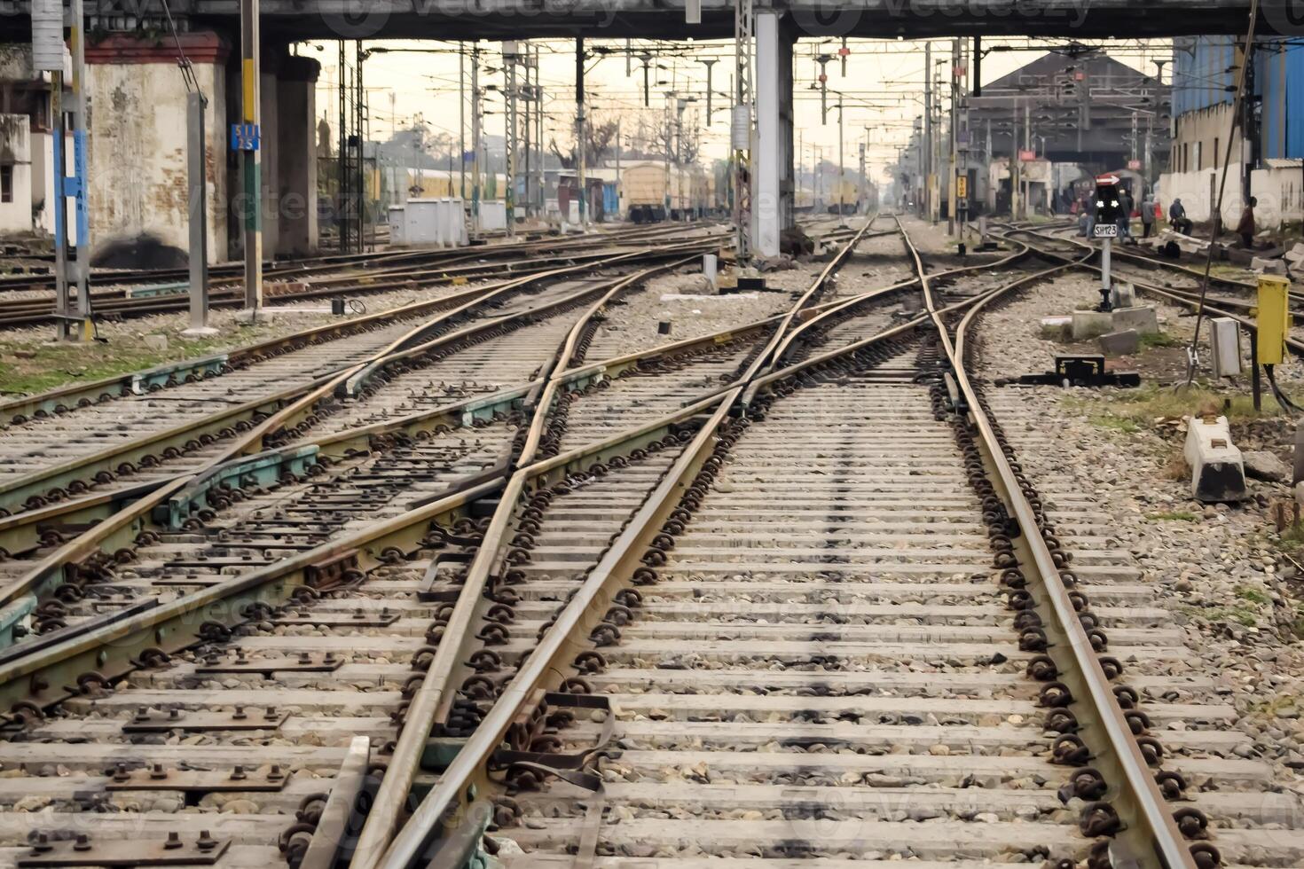 View of train Railway Tracks from the middle during daytime at Amritsar railway station in India, Train railway track view, Indian Railway junction, Heavy industry photo