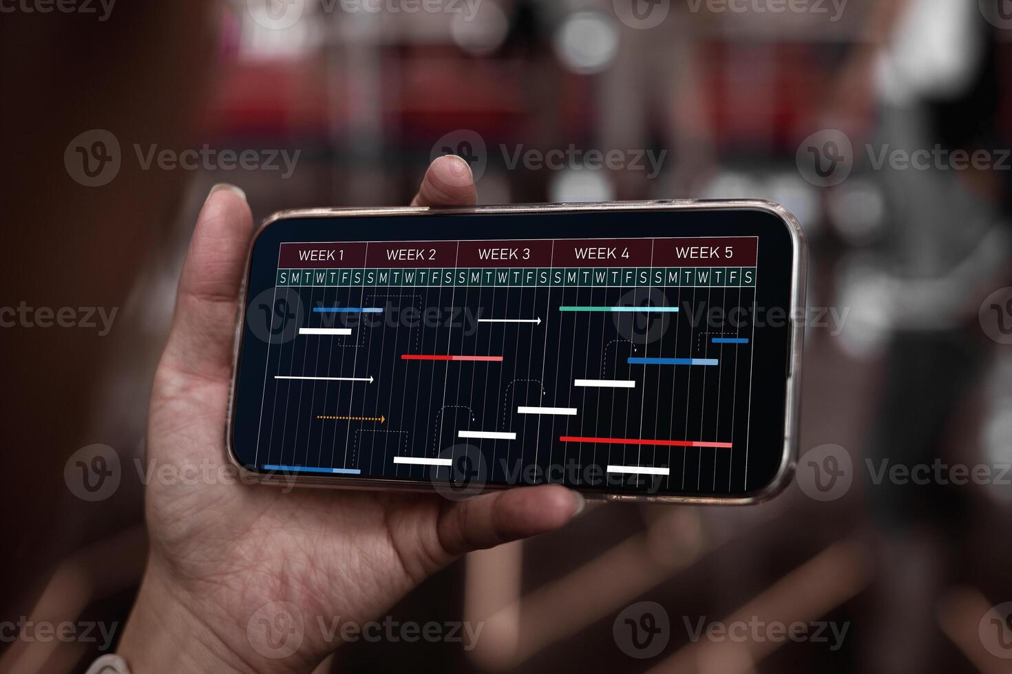 Personnel development plans and preparation of action plans. Businessman use Smartphone to manage work projects and update work progress with schedule to achieve success efficiently. photo