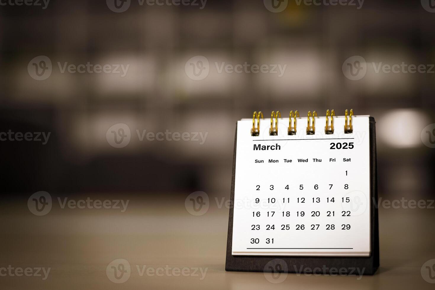Calendar page March of the year 2025 white color in meeting room in office. with copy space and business design. concept of planning and setting new strategic goals. photo