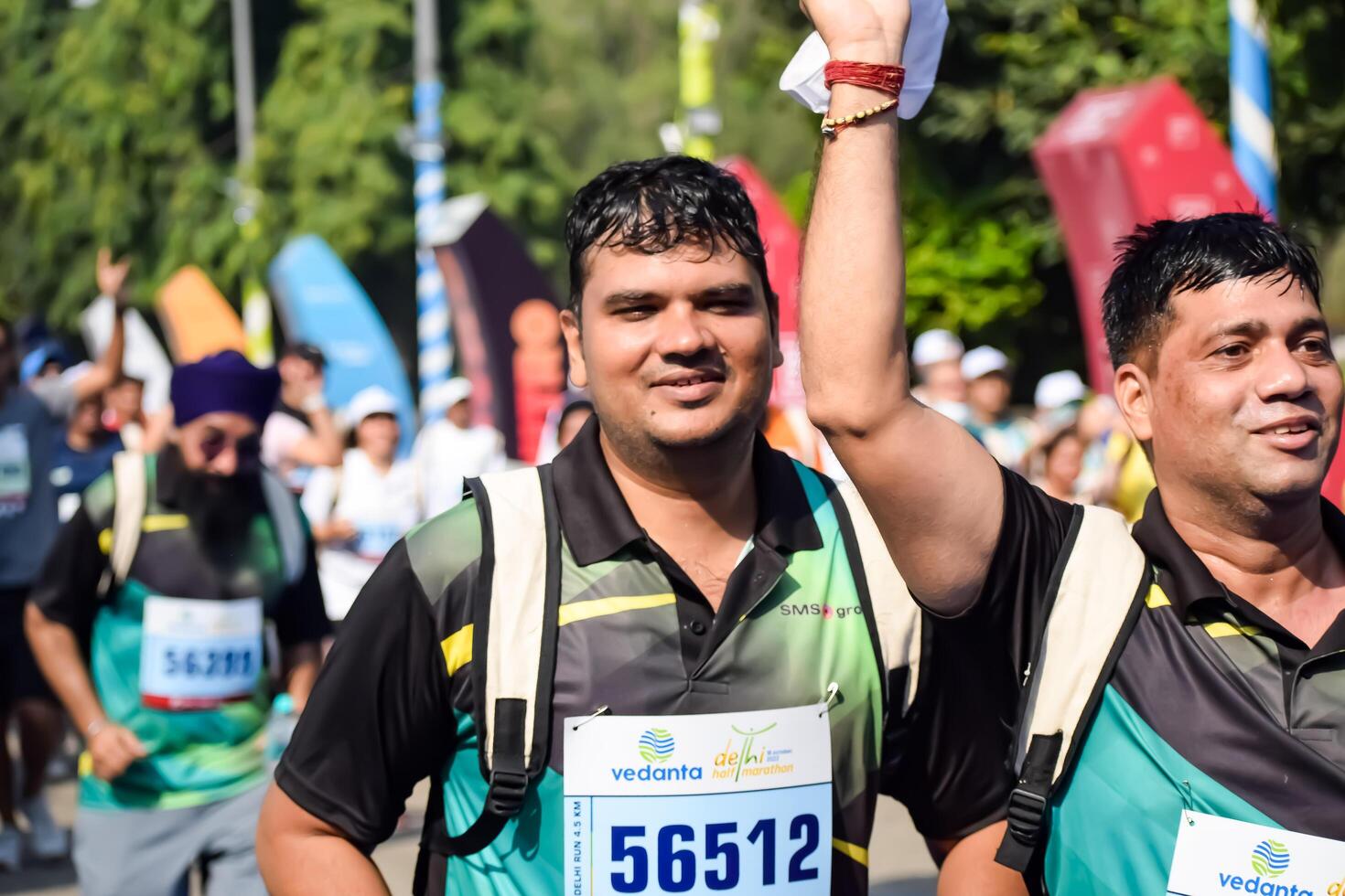 New Delhi, India - July 15 2024 - Vedanta Delhi Half Marathon race after covid in which marathon participants about to cross the finish line, Delhi Half Marathon 2023 photo