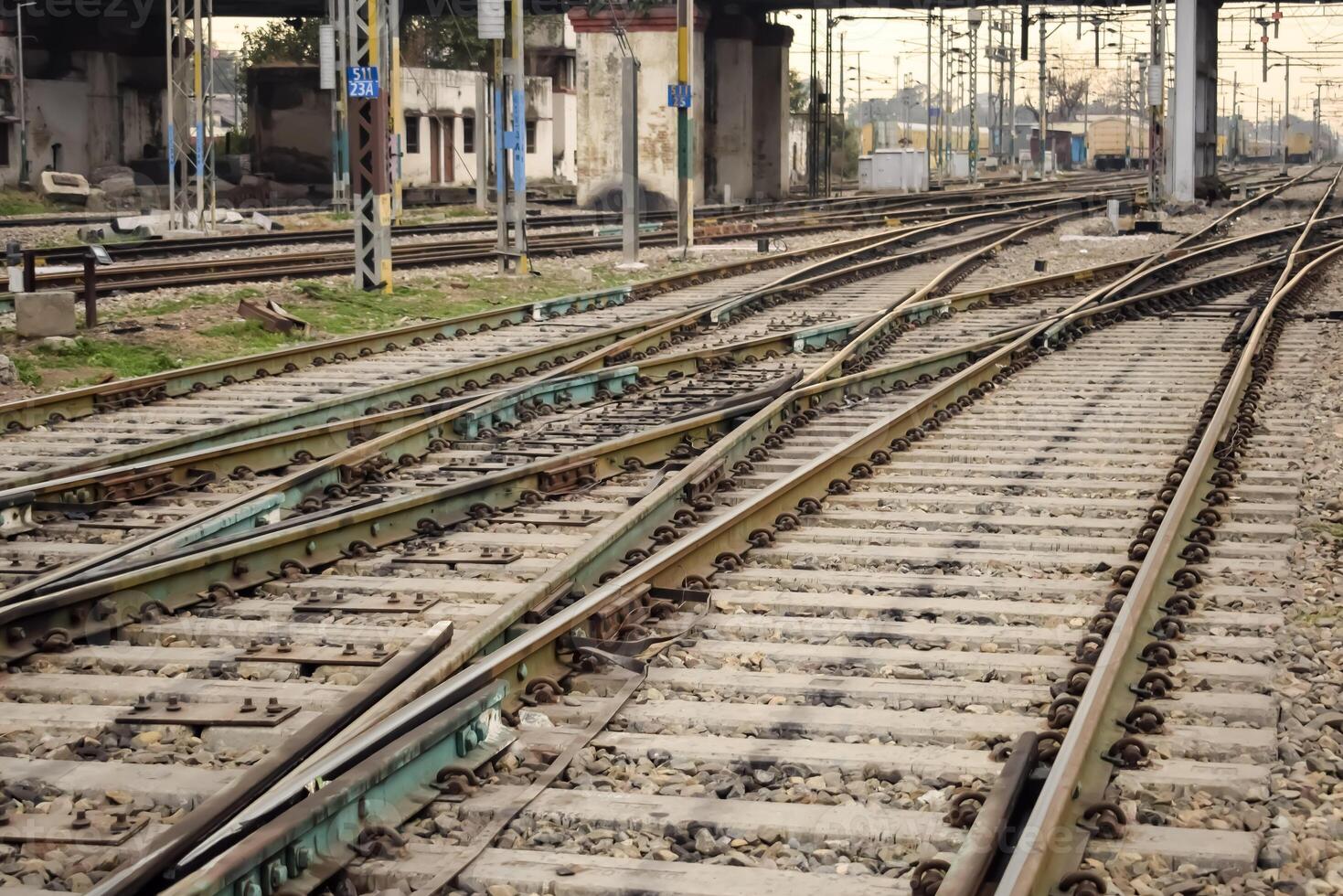 View of train Railway Tracks from the middle during daytime at Amritsar railway station in India, Train railway track view, Indian Railway junction, Heavy industry photo