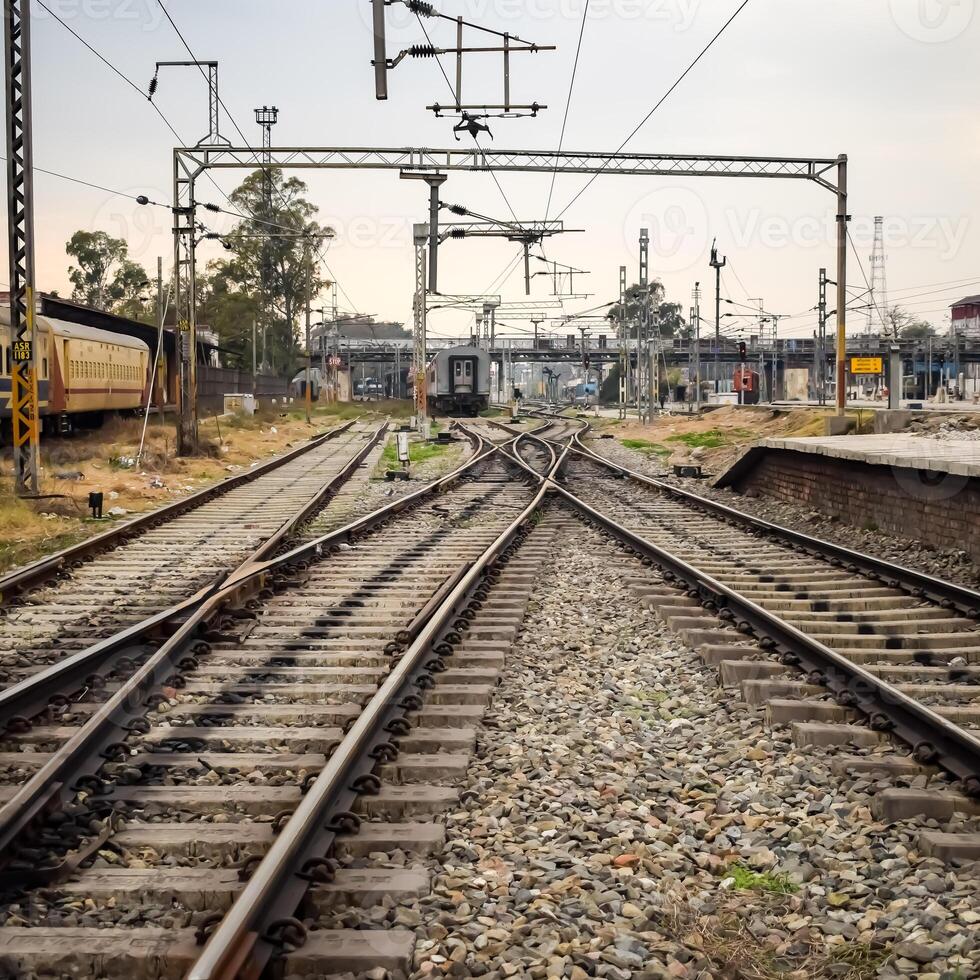 View of train Railway Tracks from the middle during daytime at Amritsar railway station in India, Train railway track view, Indian Railway junction, Heavy industry photo