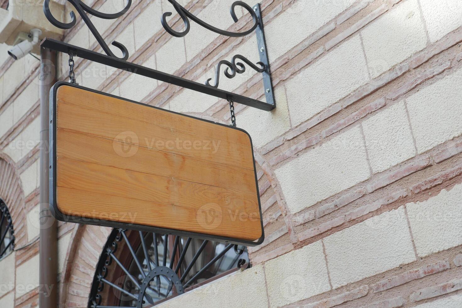 Street signboard mockup on modern city building photo